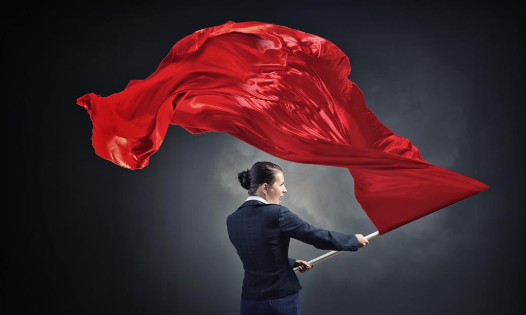 woman with red flag
